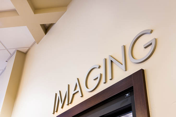 Picture of a hallway wall that says IMAGING